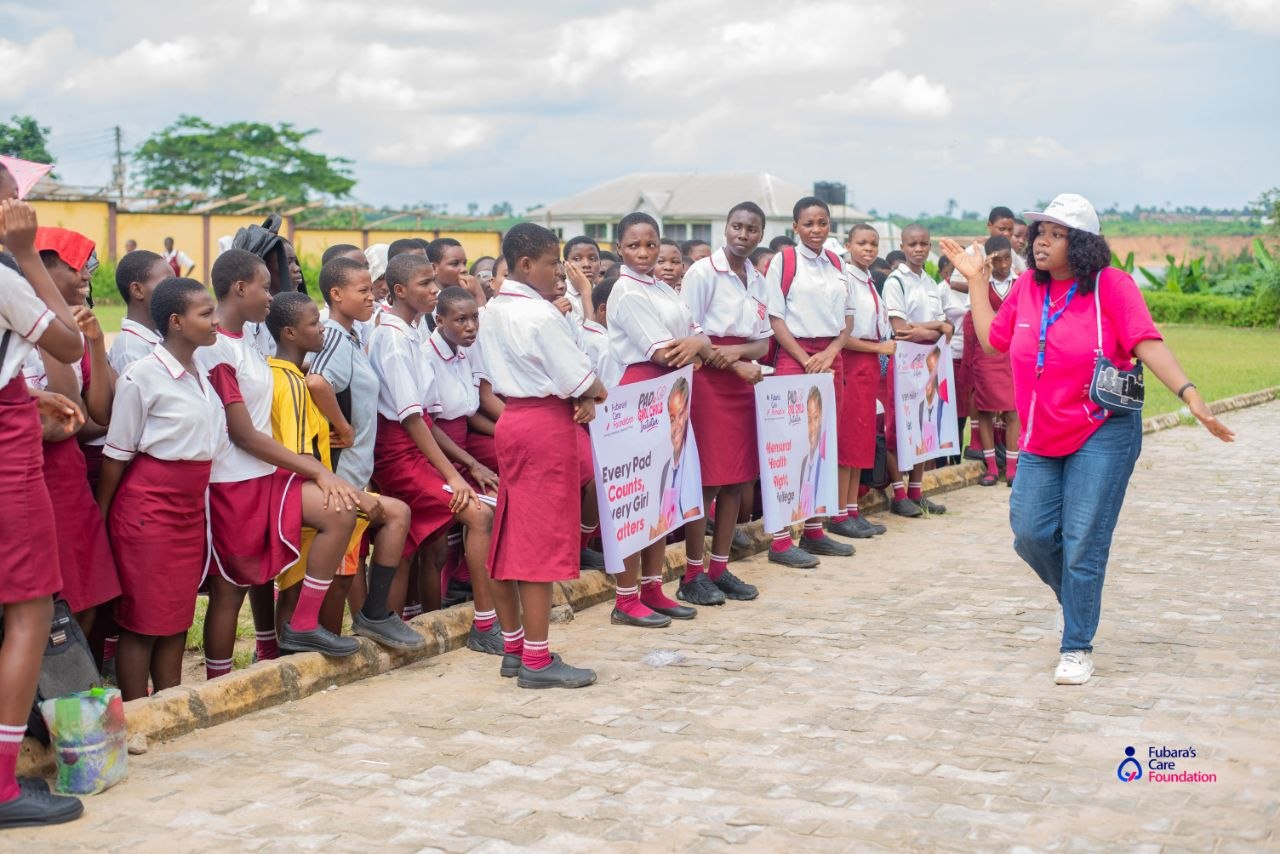 A Fubara's Care Foundation facilitator addressing students during the menstrual health talk at Akpajo