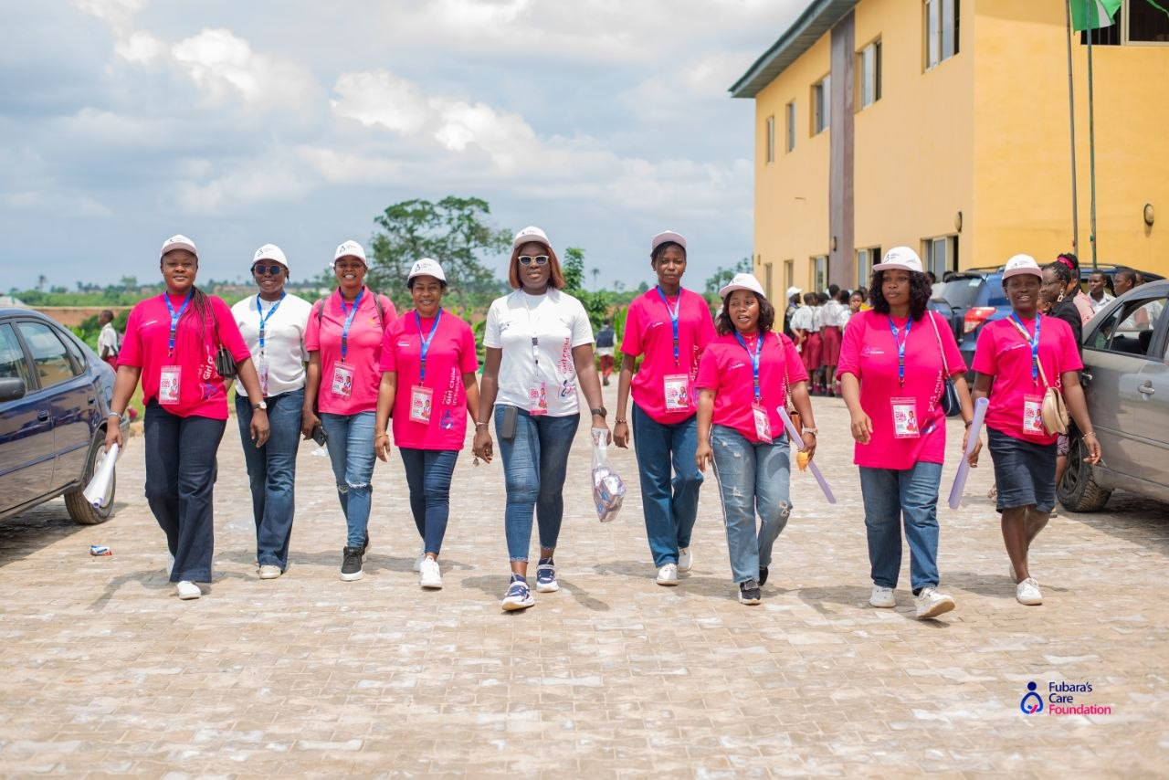 The Fubara's Care Foundation team walking into Community Senior Secondary School, Akpajo, Eleme LGA