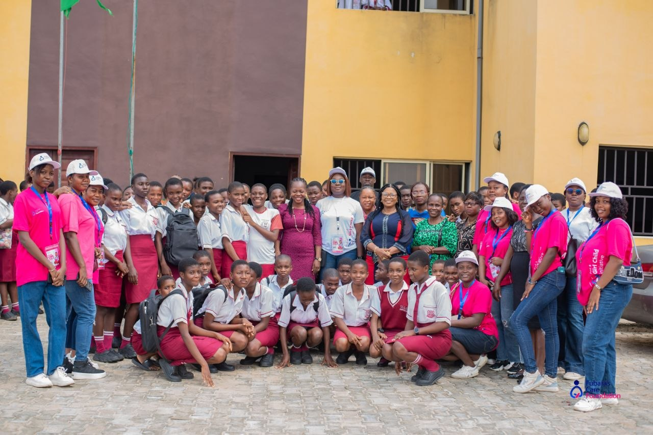 Students and the Fubara's Care Foundation team gathered for a group photograph after the Pad a Girl Child Initiative at Community Senior Secondary School, Akpajo, Eleme LGA