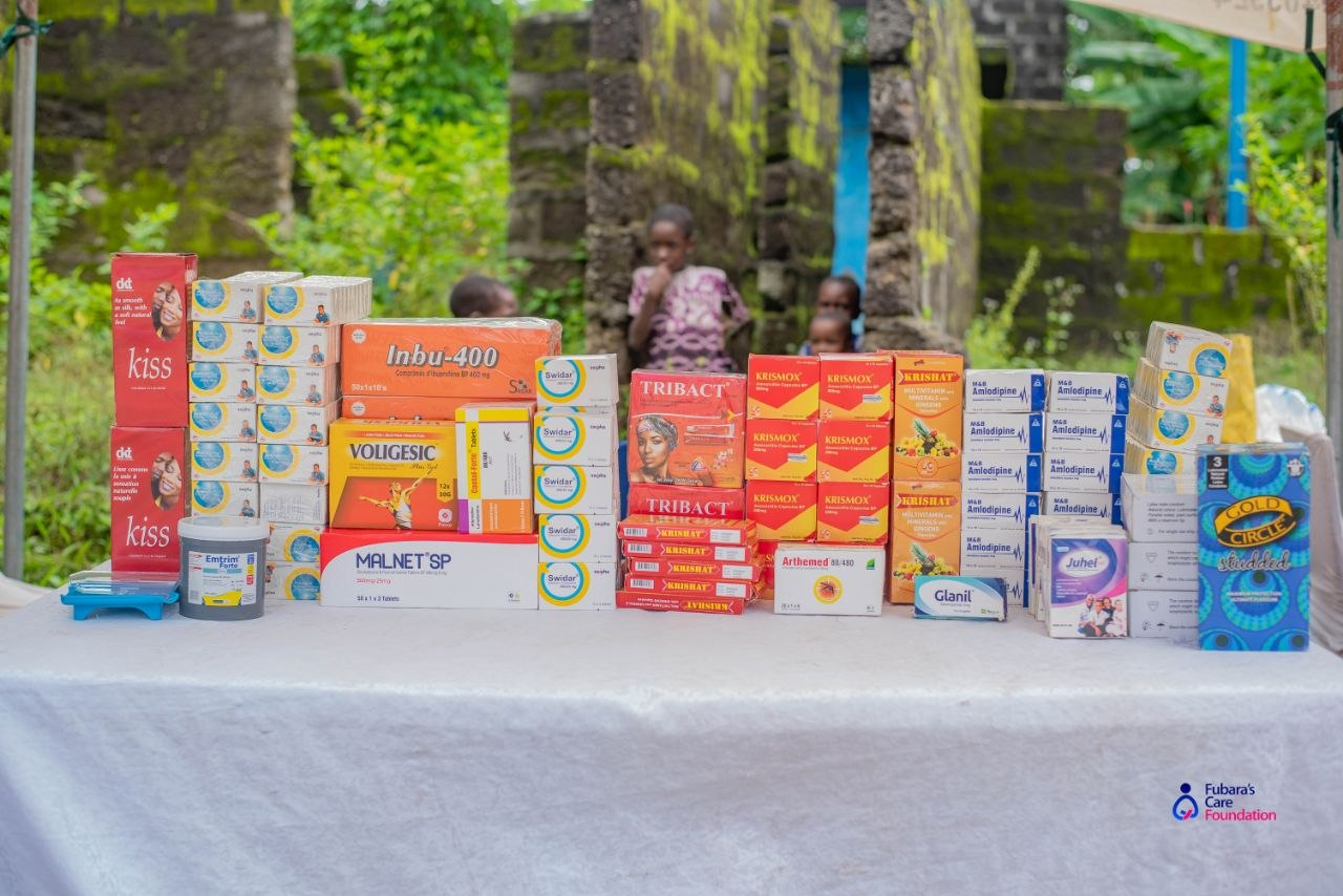 Free medications laid out at the pharmacy station, ready to be dispensed at no cost to the Bakana community