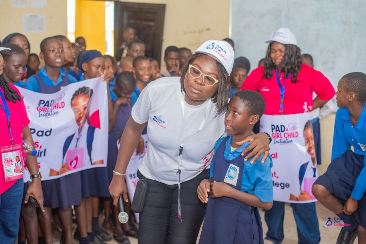 A Fubara's Care Foundation facilitator encouraging a student during the Pad a Girl Child session at Oba-Ama High School